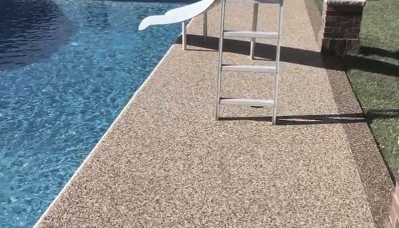 resurface pebble pool deck